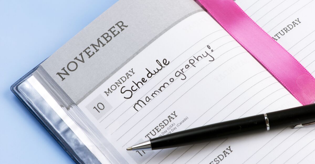 A notebook calendar with a reminder to schedule a breast cancer screening