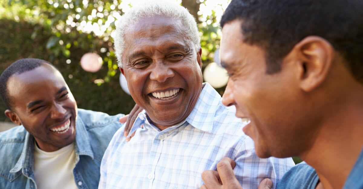 Three people laughing
