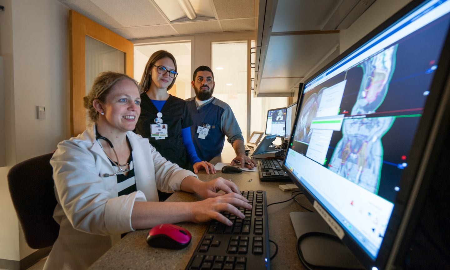 Cancer clinic medical staff reviewing images