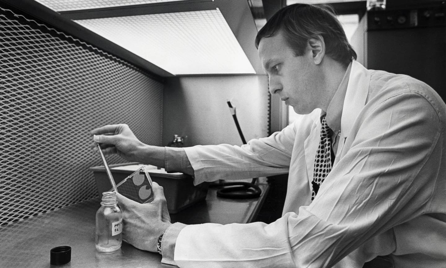 Ernest Borden working at a lab bench