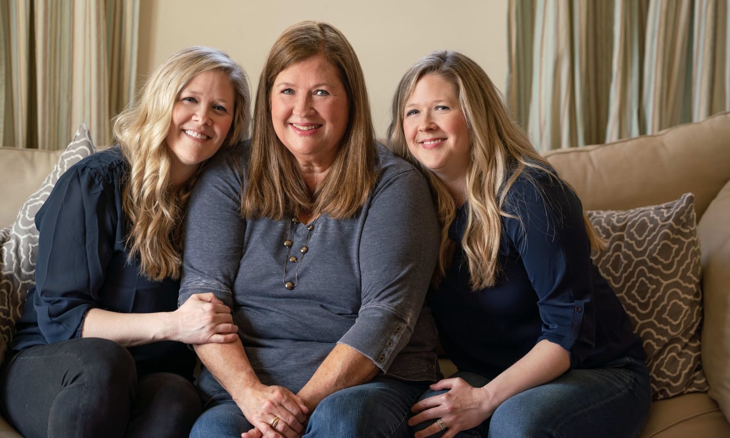 Twin sisters Paula Pope (left) and Jenna Shinstine (right) with their mother, Denise Cheramy