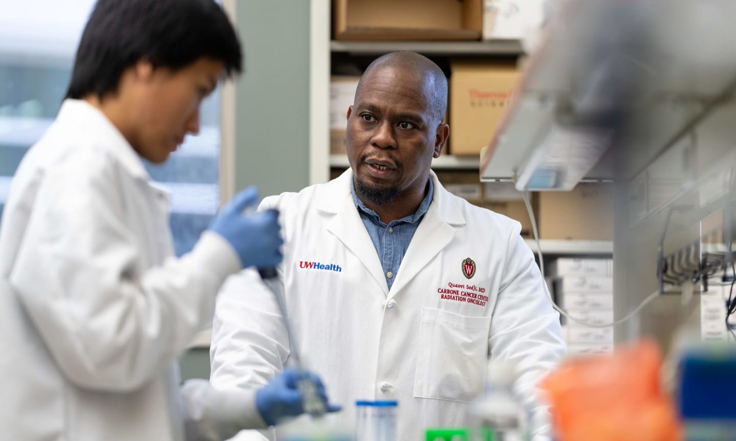 Researchers at work in a lab