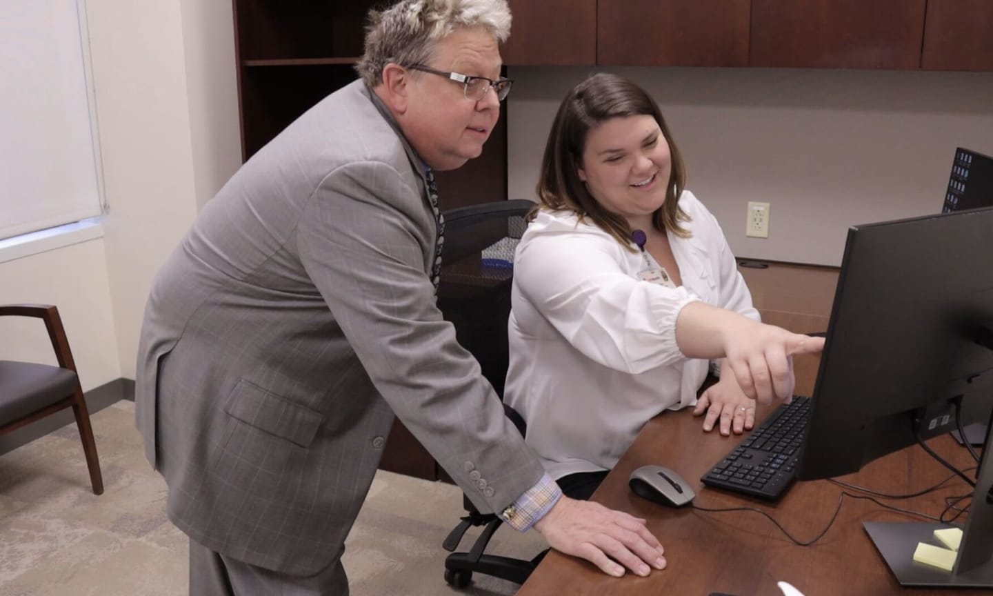 Dr. Jeffrey Royce, program director for the Headache Medicine Fellowship Program of the University of Illinois College of Medicine Rockford, and Dr. Sarah Robertson.