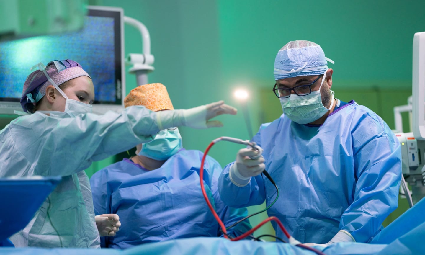 Walid Farhat, MD performing surgery