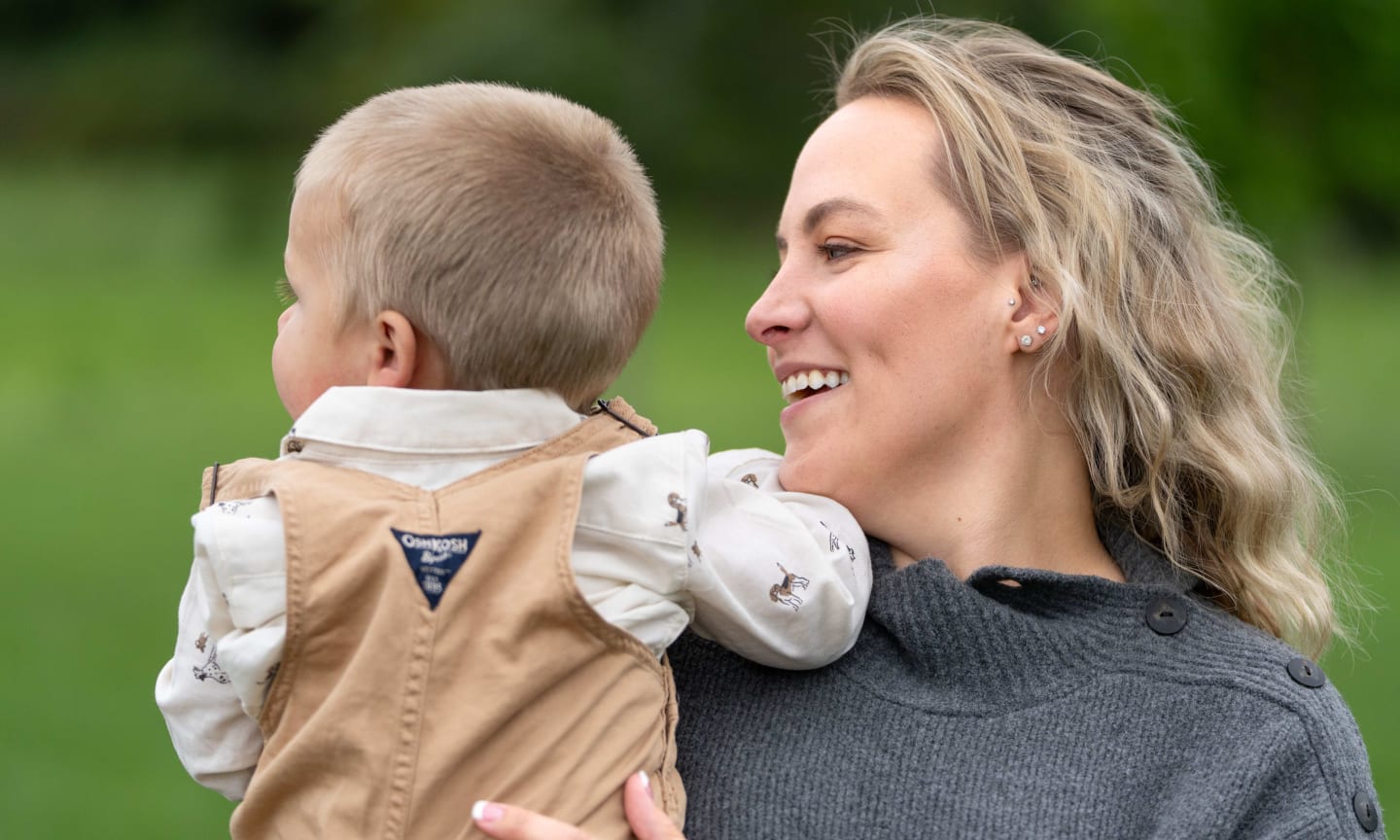 mother holding baby
