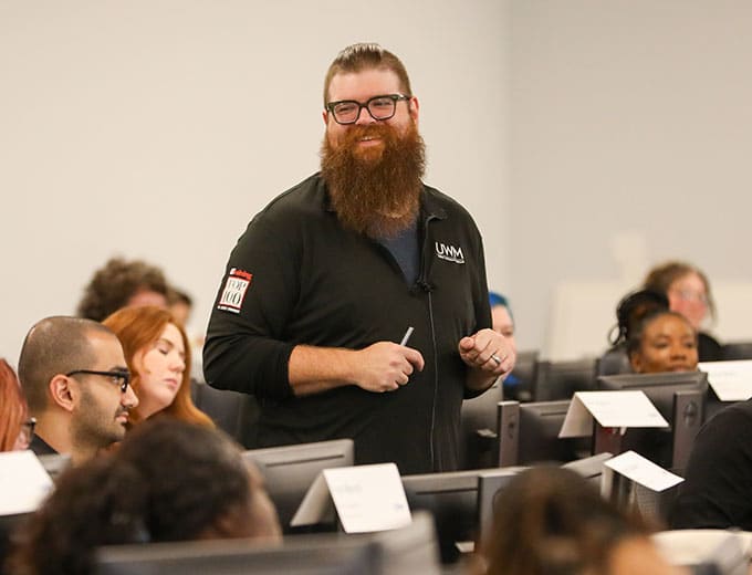 A happy training leader running a class