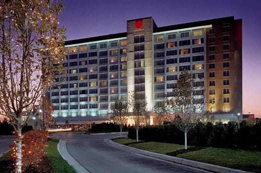 The outside of Auburn Hills Marriott Pontiac bilding at dusk