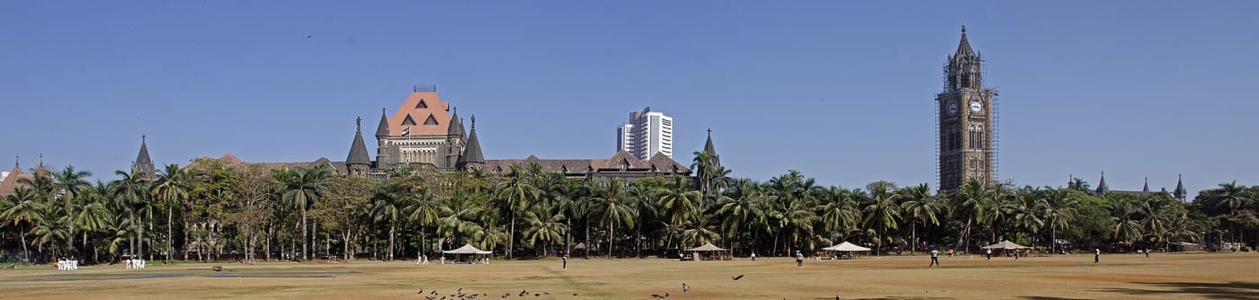Panoramic view from Oval Maidan. From Left to right, Bombay High Court, Bombay Stock Exchange and Rajabai Clock Tower
