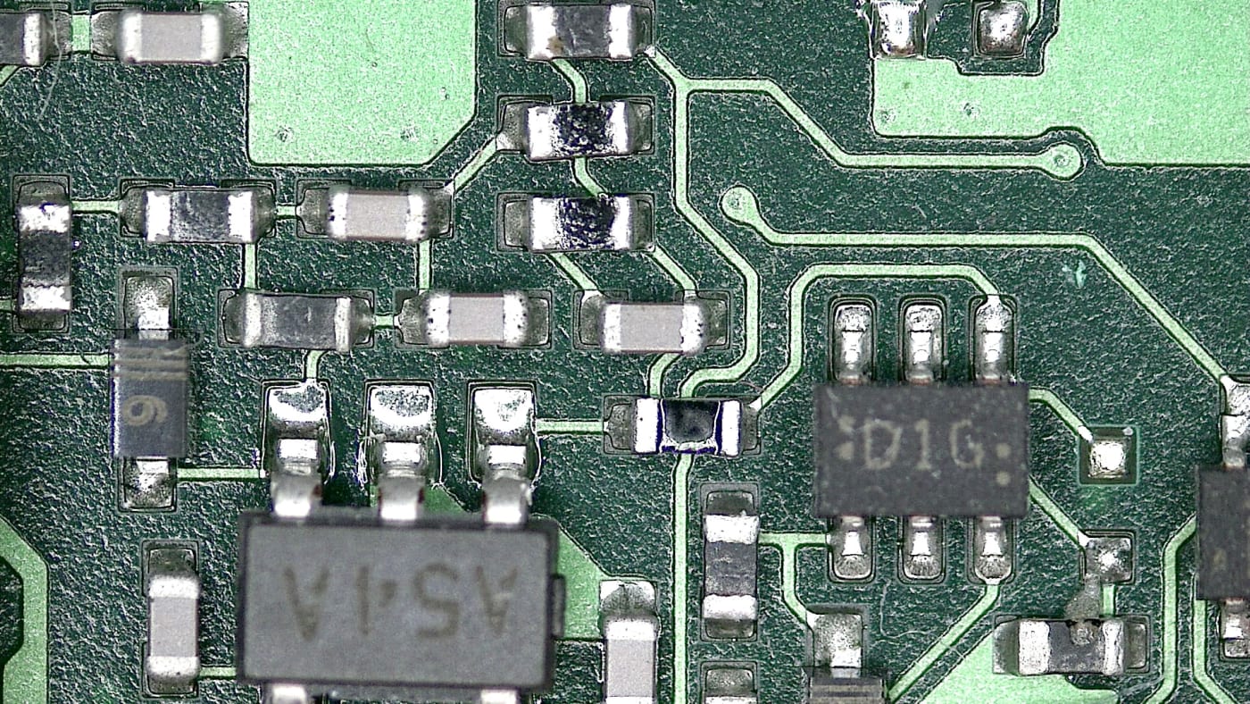 microphoto of some electronics circuit board (I think it is from some smartphone) photo taken with a digital microscope author: Jan Helebran