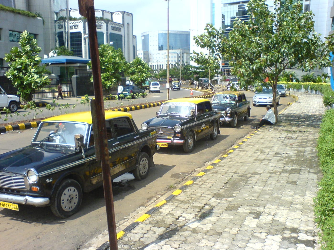 Taxis line up outside the State Bank of India office in BKC on a sunny afternoon