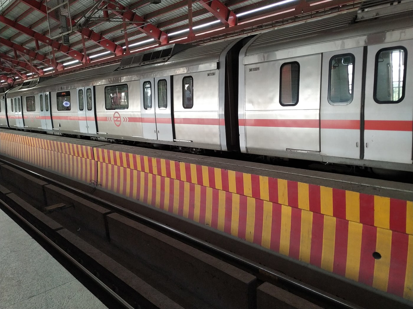 Delhi Metro train red line at Shaheed Sthal metro station.