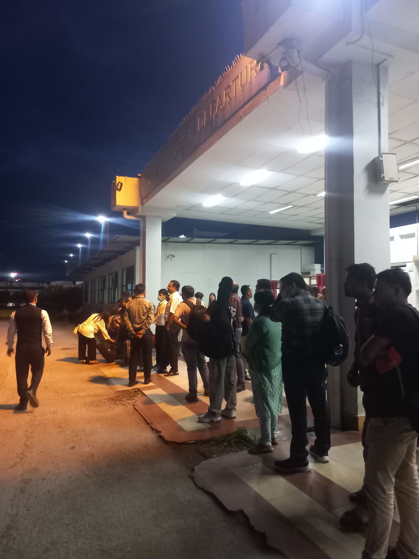 Passenger of Air India Express waiting for the shuttle at the departure Terminal of Imphal Airport