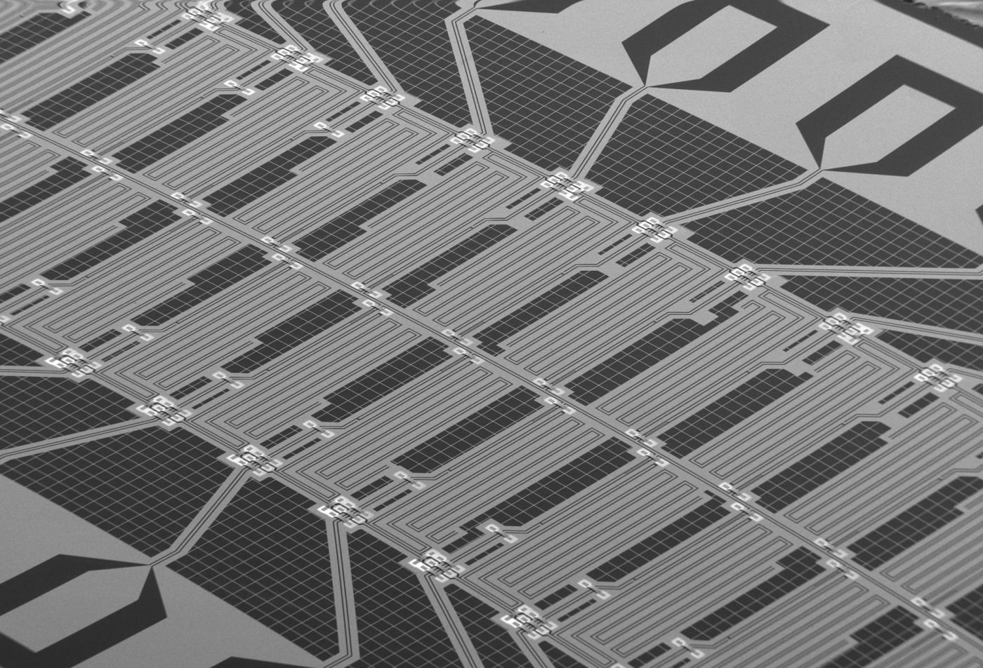 SEM image of a quantum chip composed of an array of 24 artificial atoms (aluminum qubits). Here, you can consider the key architectural elem