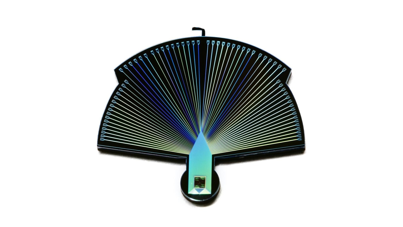 This close-up photograph shows a single Performance-Enhanced Array for Counting Optical Quanta (PEACOQ) detector. Smaller than a dime, a sin