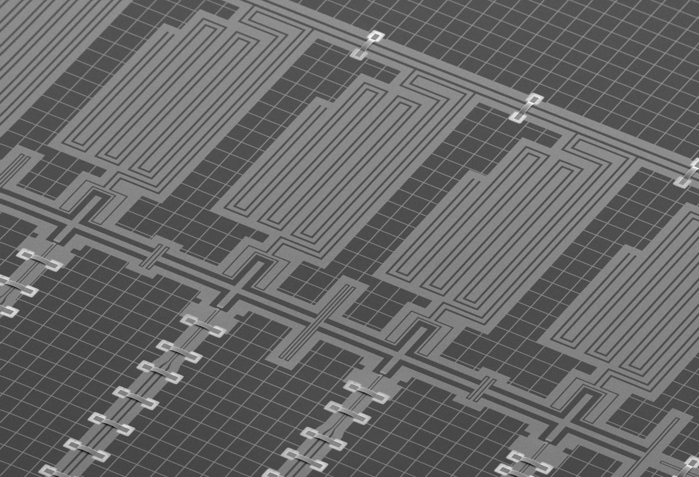 SEM image of 11 superconducting qubits chip. The qubits are connected in a chain to form a new type of quantum simulator. Here, you can cons