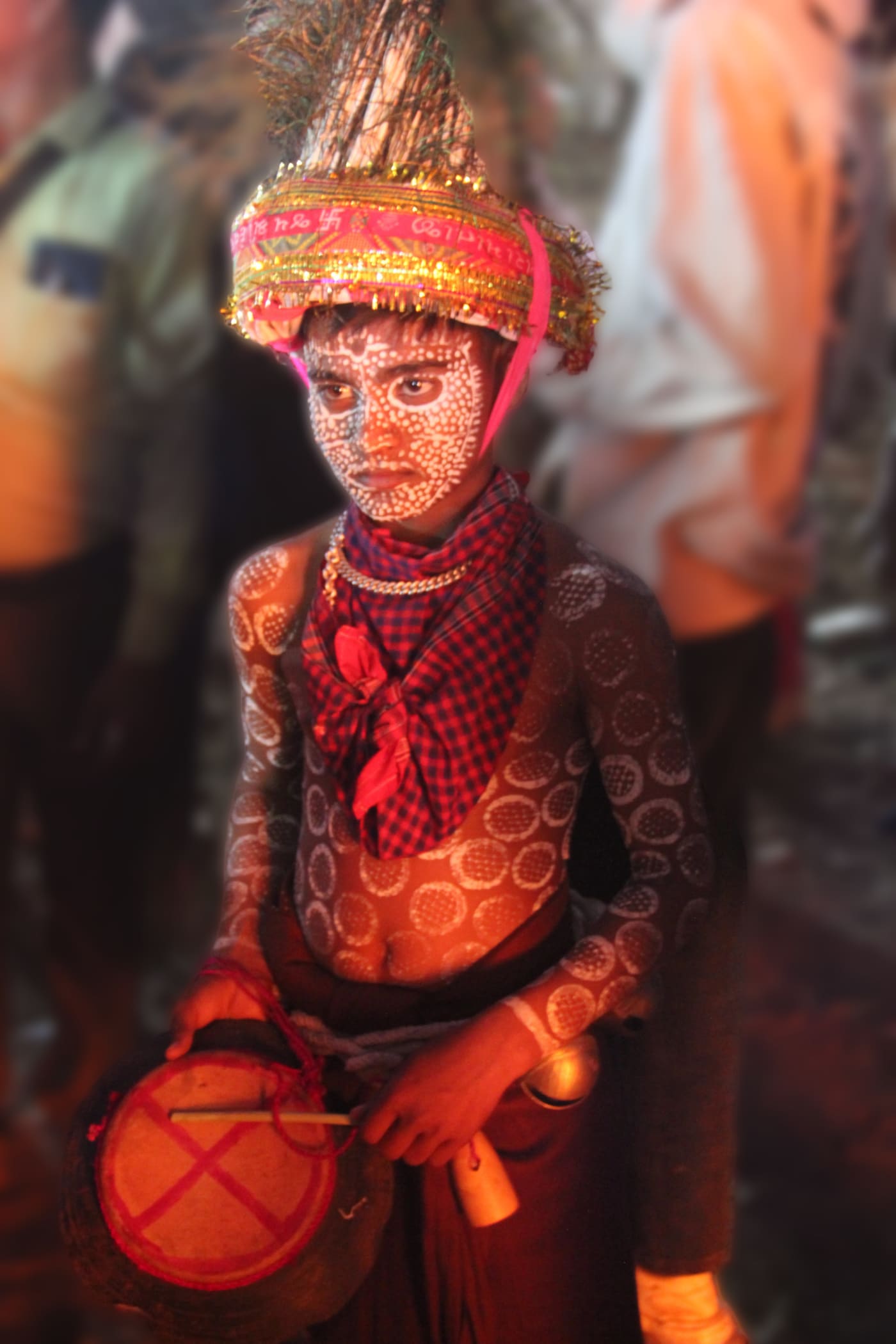 This photograph captures a young Adivasi boy during the Holi festival in the Nandurbar district, nestled in the Satpuda range. His body is a