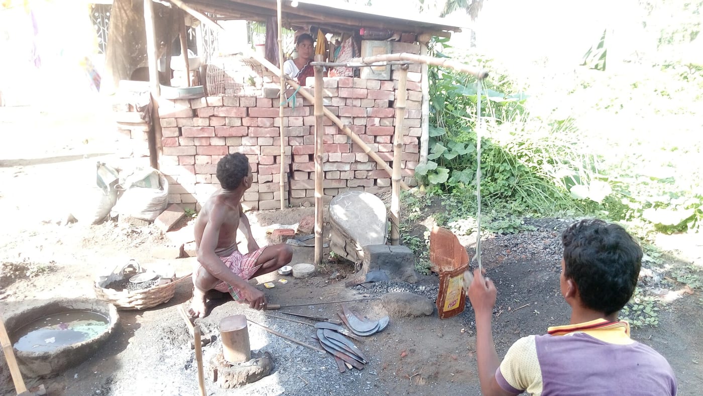 The blacksmith hitting hard- a livelihood at stake