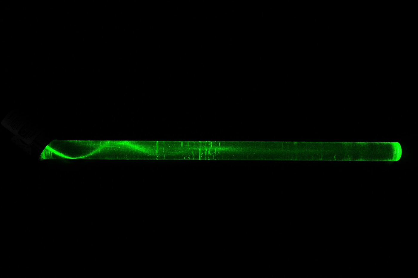 Propagation of light through the core of an optical fiber. Macro visualization.
