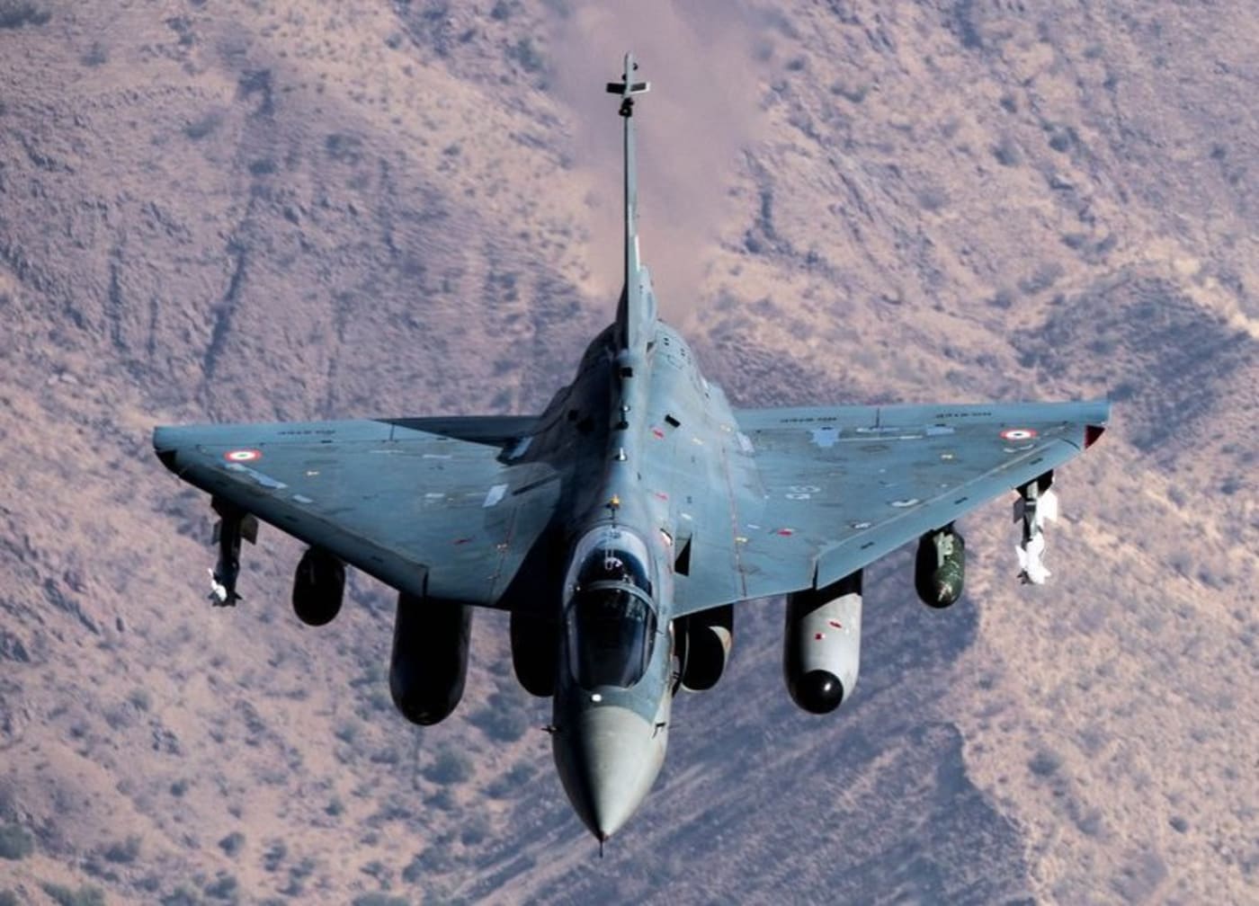 A Tejas aircraft armed with weapons.