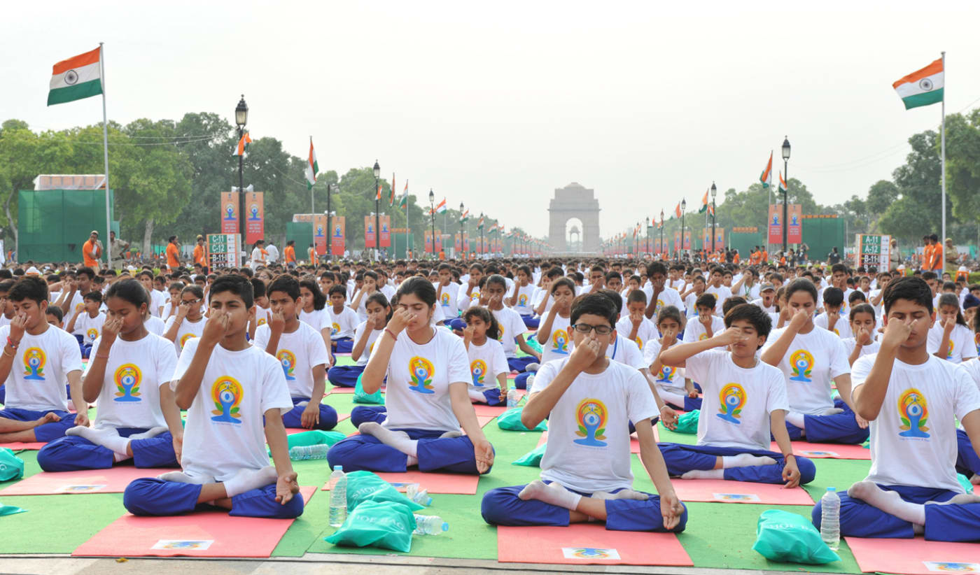 The participants performing Yoga at Rajpath on the occasion of International Yoga Day, in New Delhi on June 21, 2015.