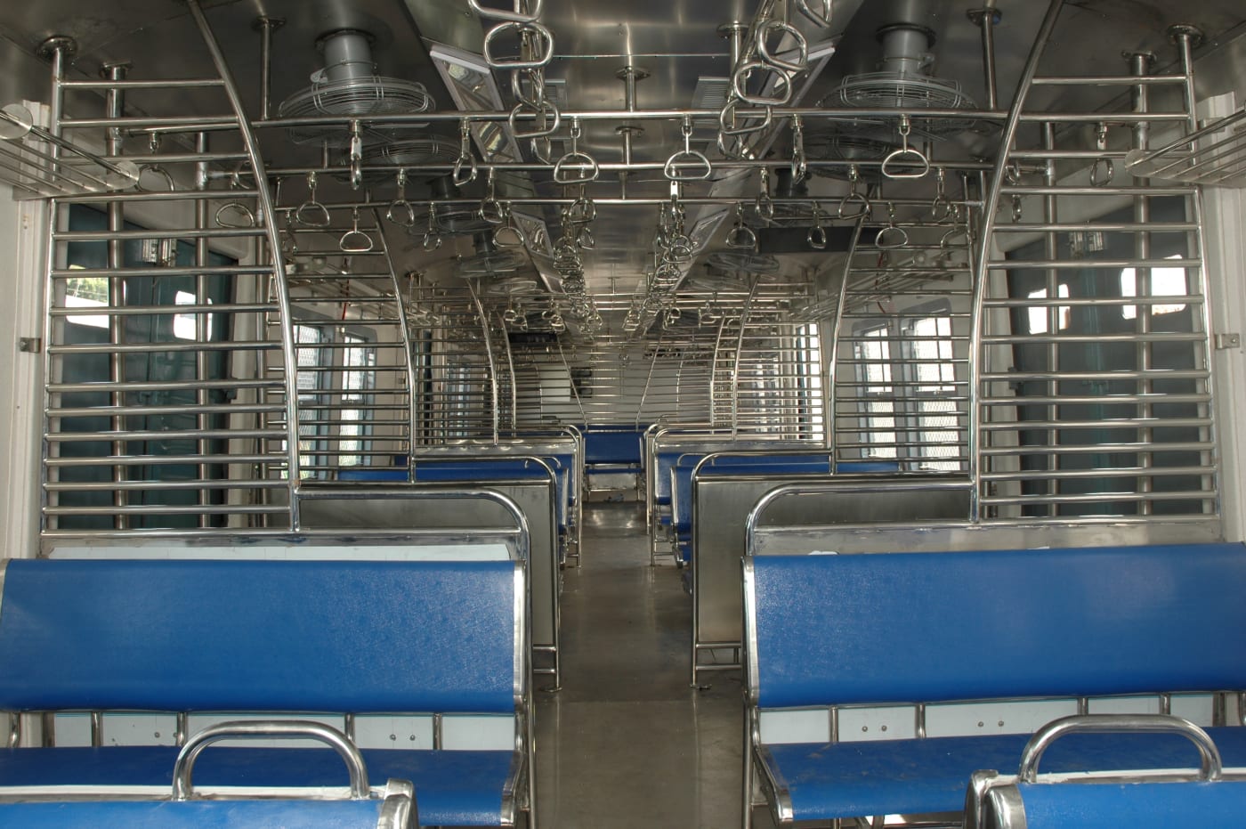 The interior of an Indian-built passenger coach.