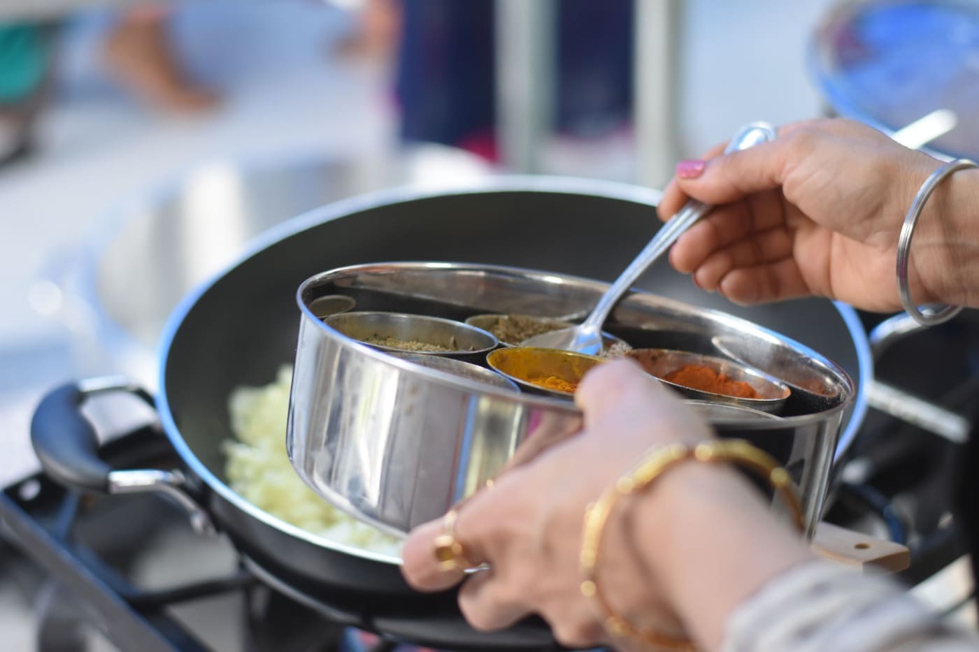 Cooking on a gas stove.