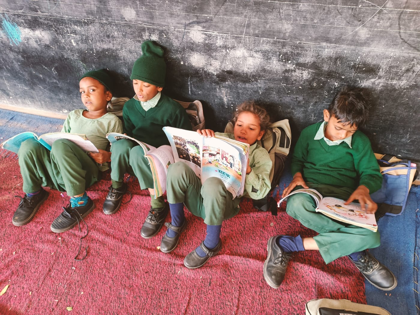 Children reading at Government Primary School Asir, Haryana.