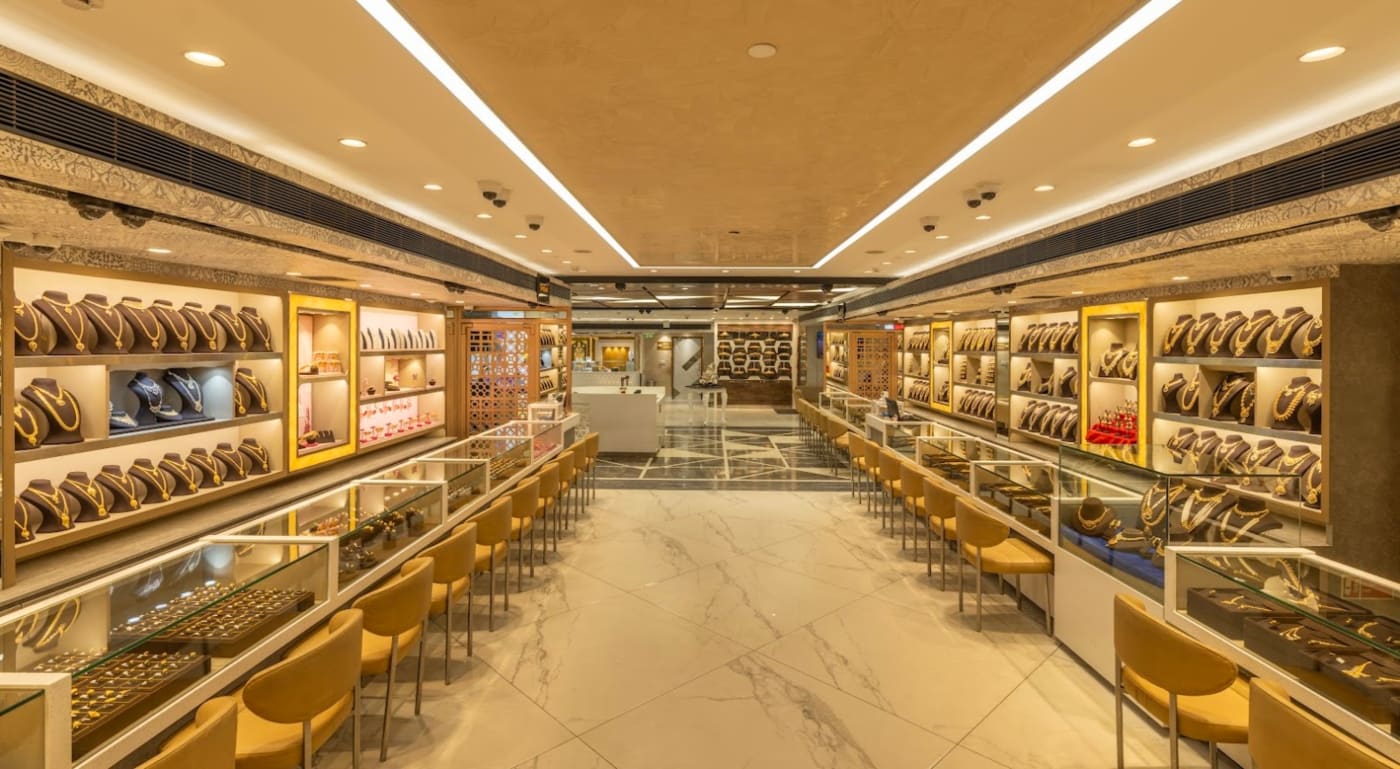 Gold jewellery on display inside a Bhima Jewellers showroom in Rajahmundry, Andhra Pradesh.