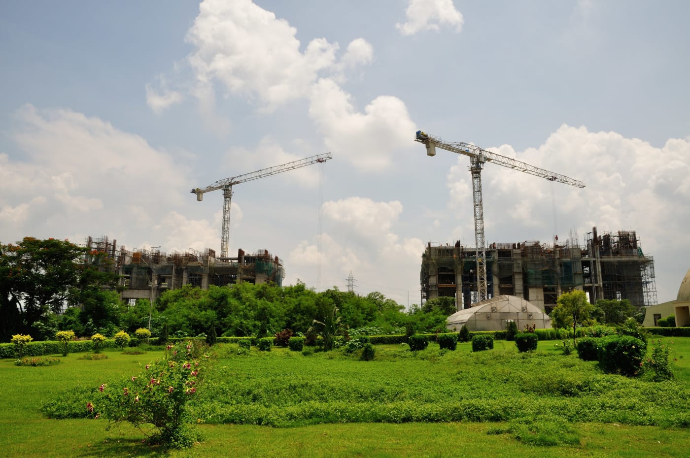 The Forum Atmosphere residential complex under construction, with tower cranes, in Kolkata, West Bengal.