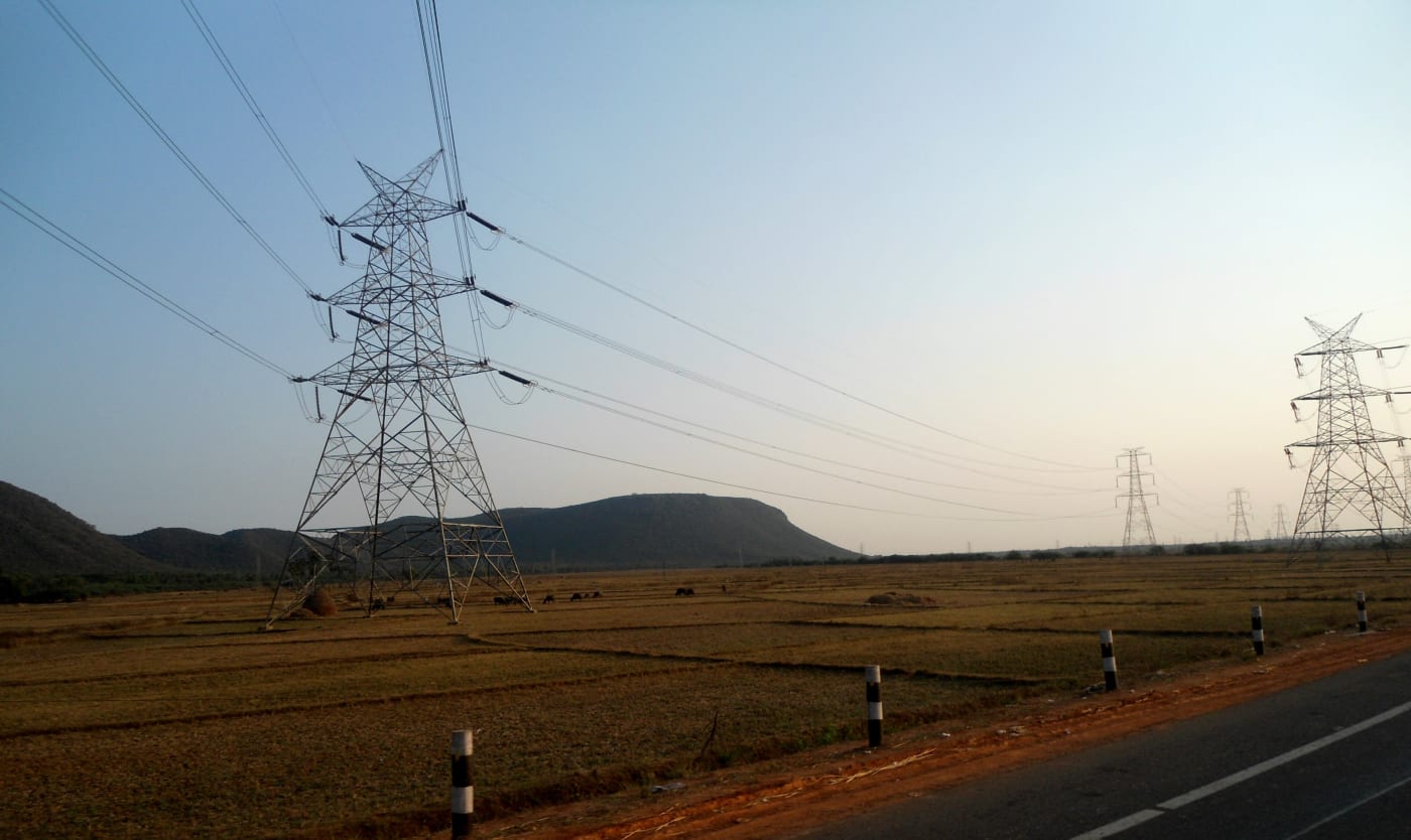 High-voltage transmission lines crossing fields at Payakaraopeta, Visakhapatnam district, Andhra Pradesh.