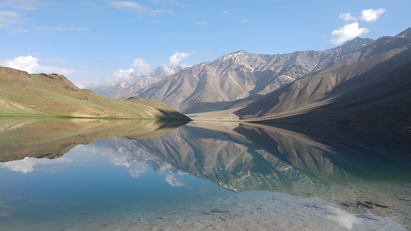 Himalayan peaks reflected in Chandra Taal lake, Lahaul and Spiti, Himachal Pradesh.
