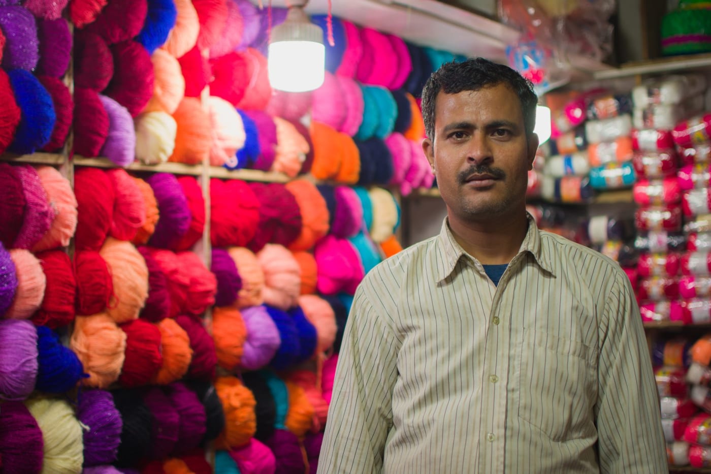 A shopkeeper in his yarn shop in Madhubani, Bihar.