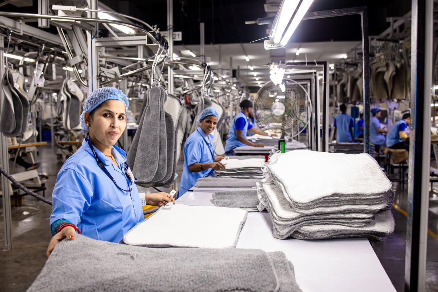 Women workers on a textile production line at a factory in India.