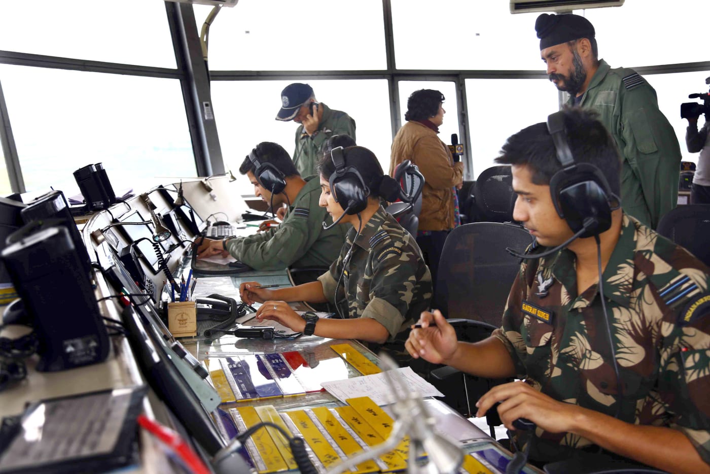 Indian Air Force personnel at the control tower consoles of Air Force Station Srinagar.