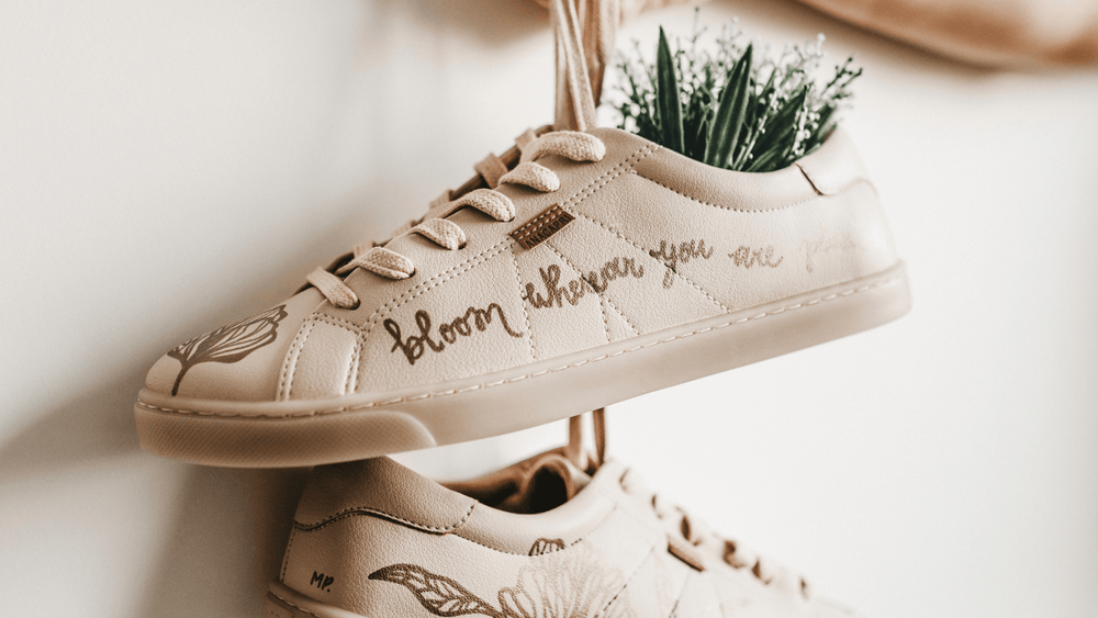 white vegan shoes on a table