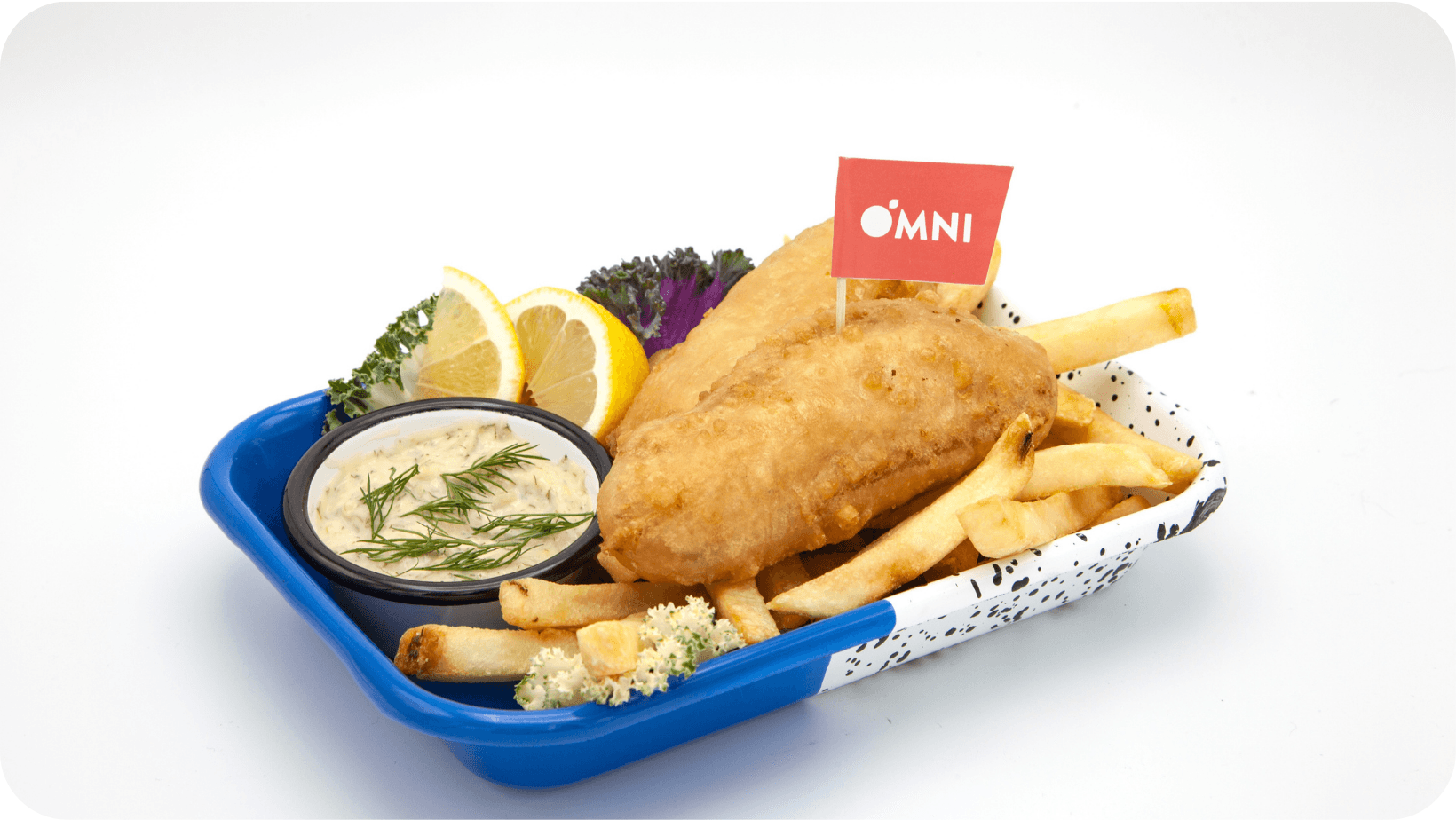 vegan fish and chips with lemon, tartar sauce in a takeaway tray on a grey background