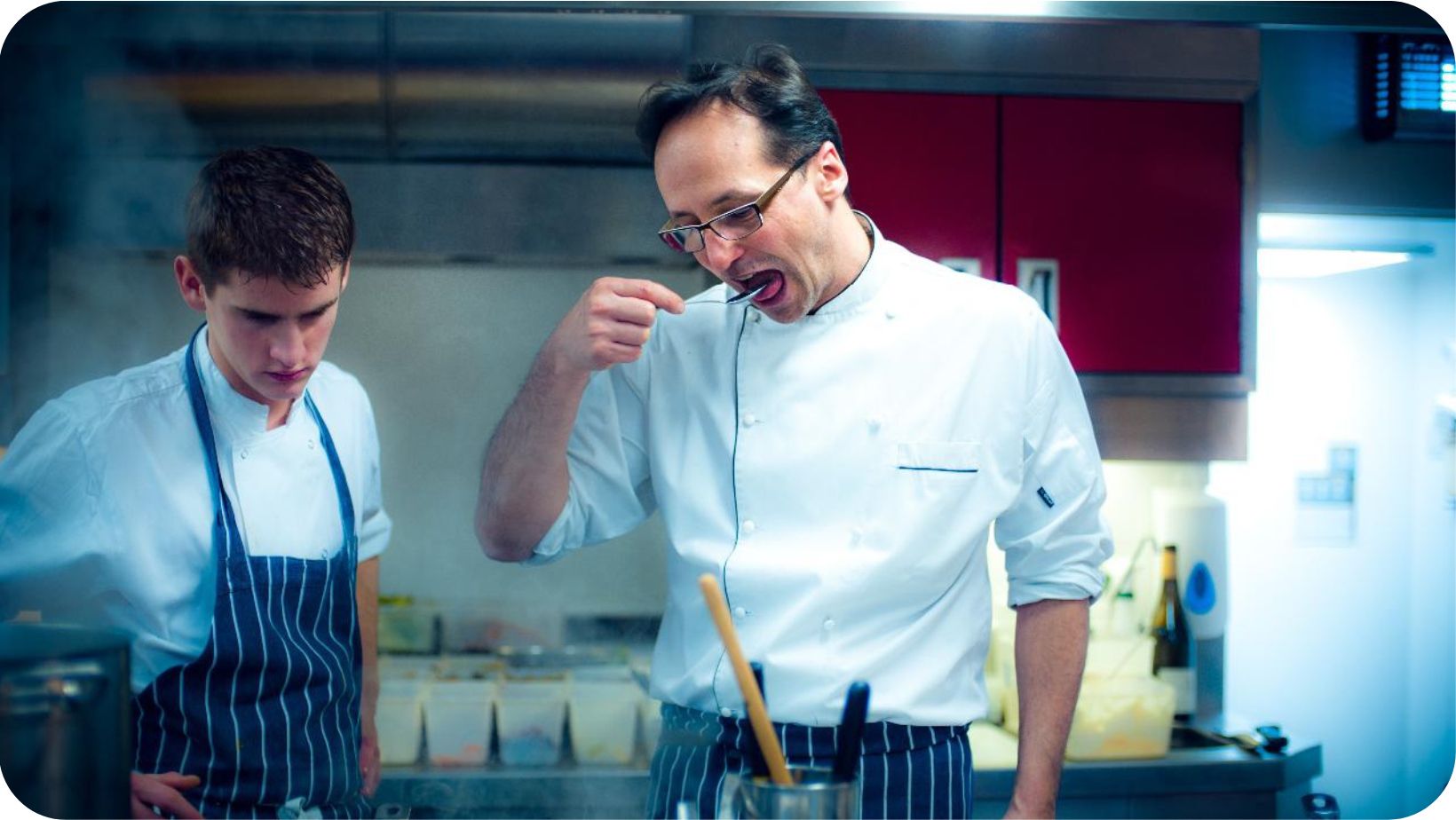 Vegan chef Alexis Gauthier tasting some food next to one of his chefs in vegan fine dining restaurant Gauthier Soho