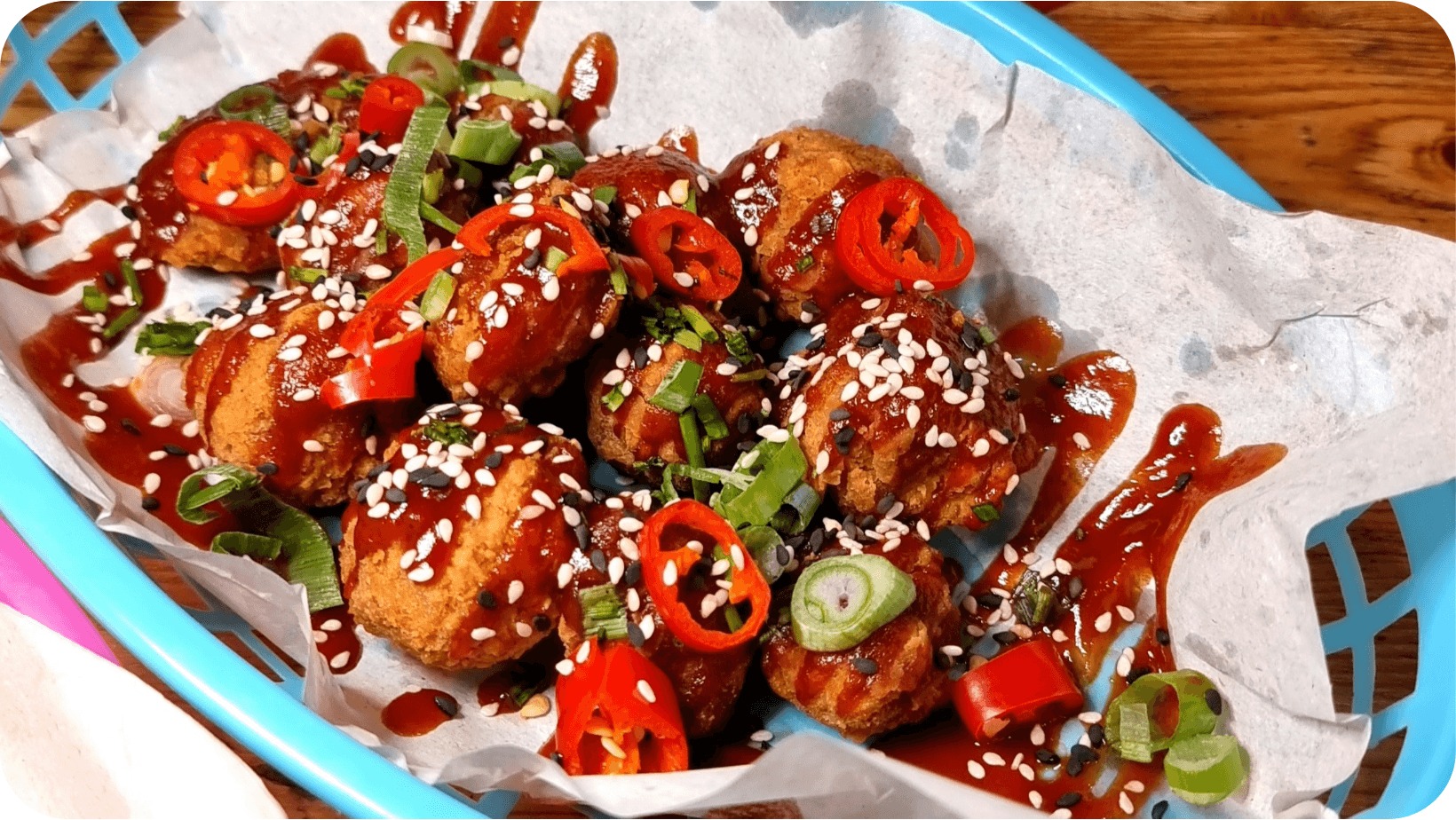 Vegan Noms Brighton colourful vegan BBQ poppers topped with chilli, sesame seeds, spring onions 