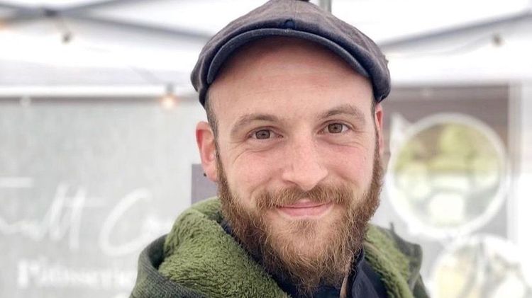 Smiling bearded man with a hat (Thibault Courtoisier) 