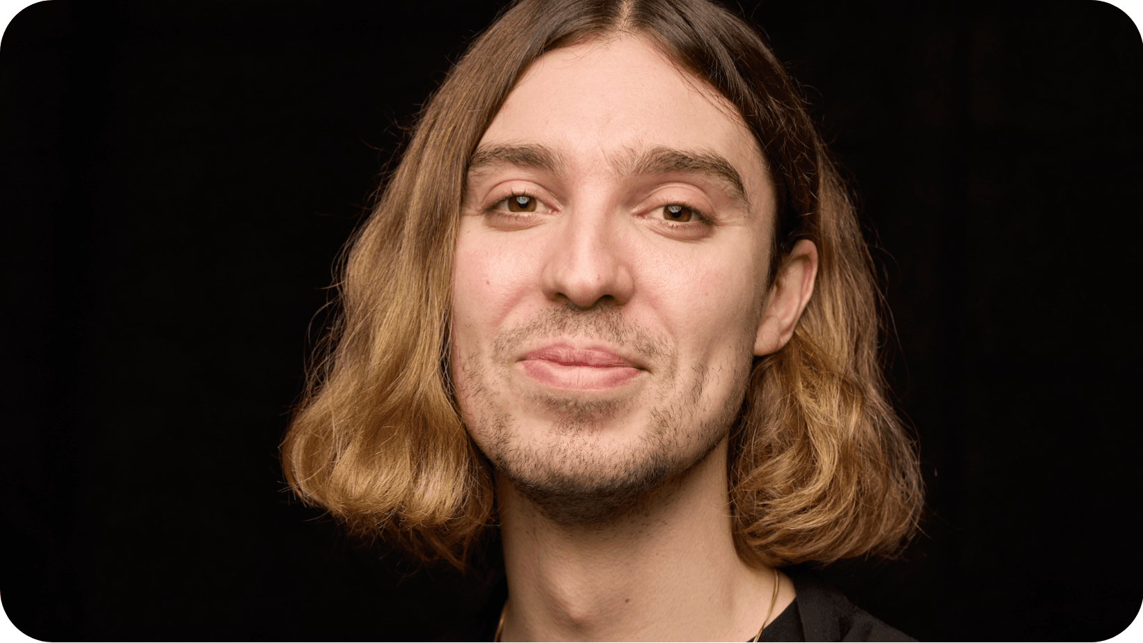 Picture of Ed Winters (Earthling Ed) smiling with a dark background