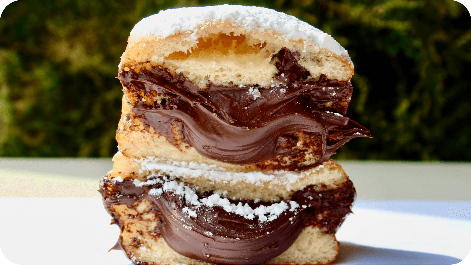 Vegan doughnut oozing with chocolate from Scoop n Dough in Lisbon