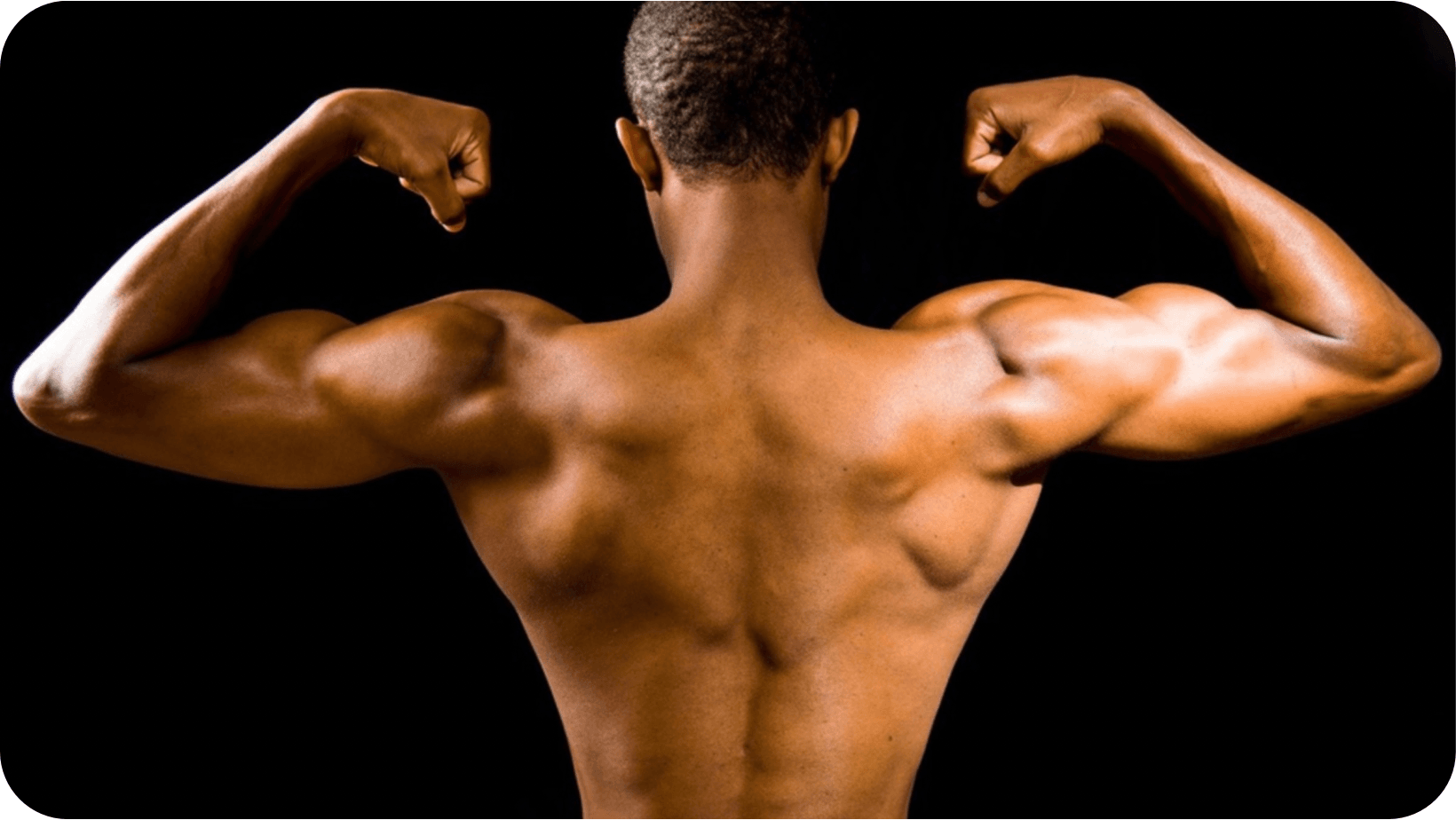 Man flexing his muscles in his arms and back