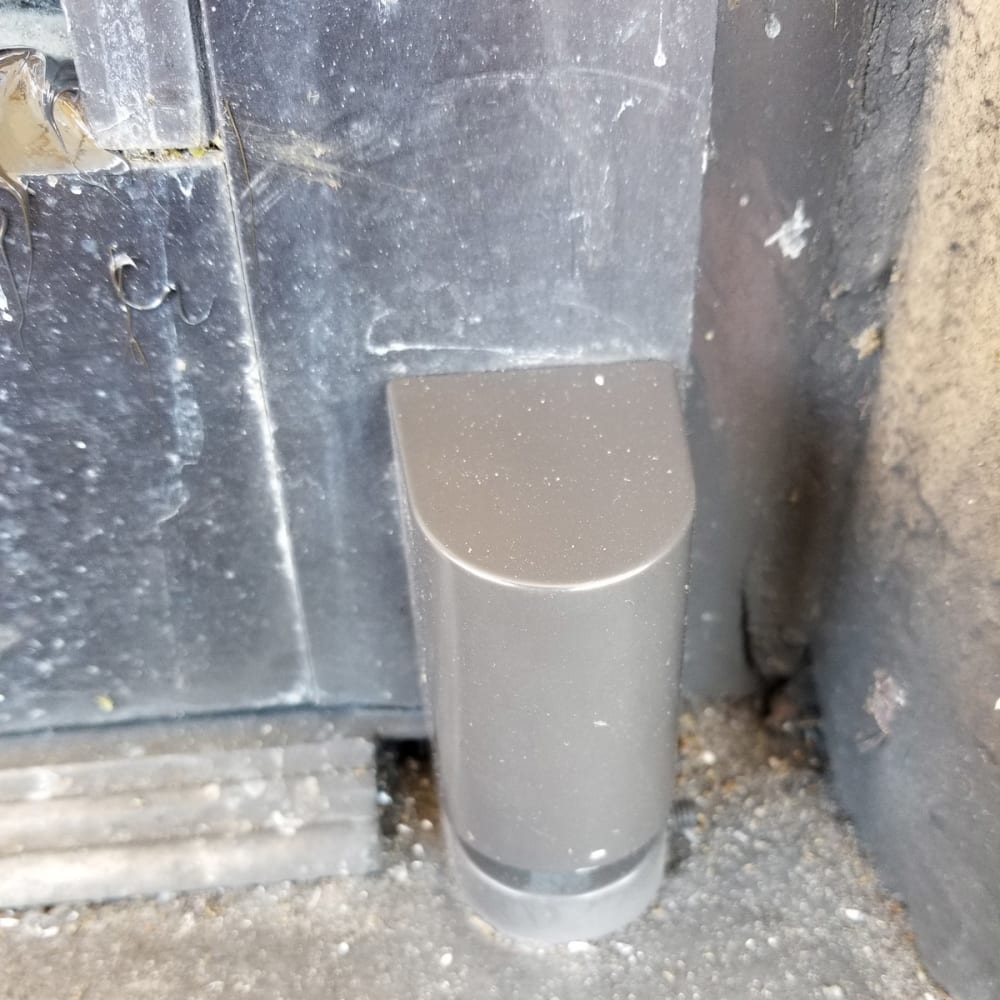 misaligned commercial glass door with gap at top from worn pivot hinge in Winter Park FL