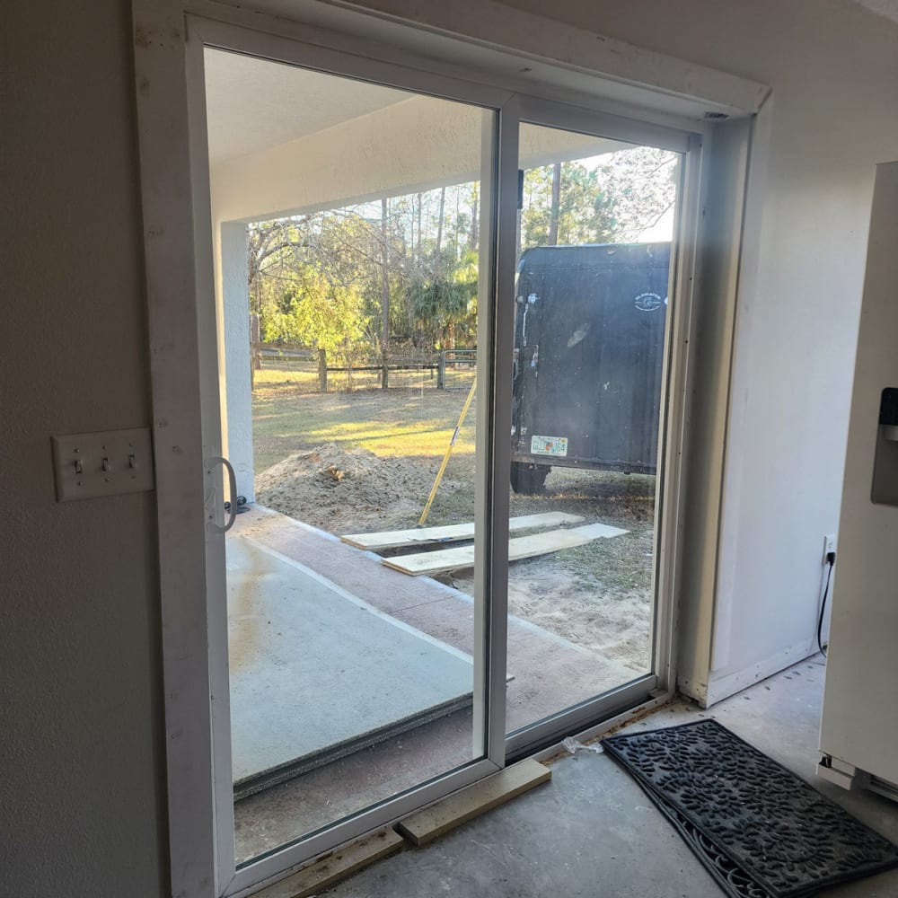 Townhome community in Central Florida with multiple sliding patio doors maintained through hardware repairs