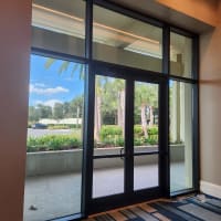 Five-star review from a Lake Mary property manager after matching entry glass repairs across multiple office suites