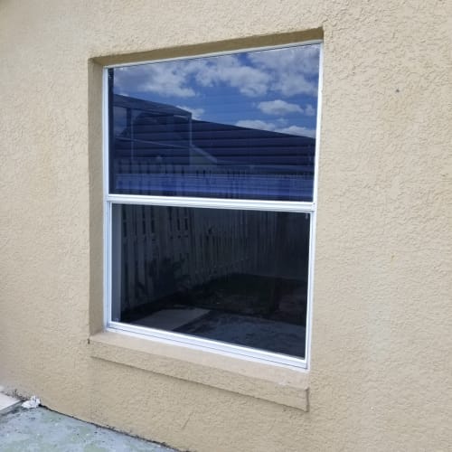 Bedroom window cracked glass repair Kissimmee FL. Click to open in modal.