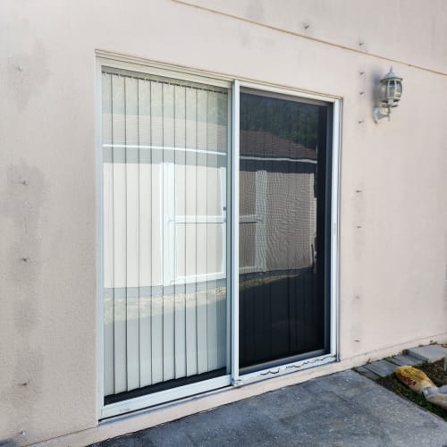 Sliding door weatherstripping and interlock replacement Sanford FL. Click to open in modal.