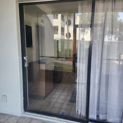 Emergency board-up and sliding door tempered glass replacement Altamonte Springs FL. Click to open in modal.