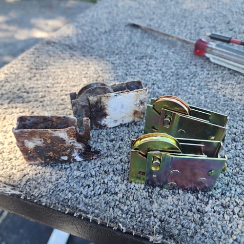 Sliding glass door roller and track repair for smoother operation in Orlando FL. Click to open in modal.