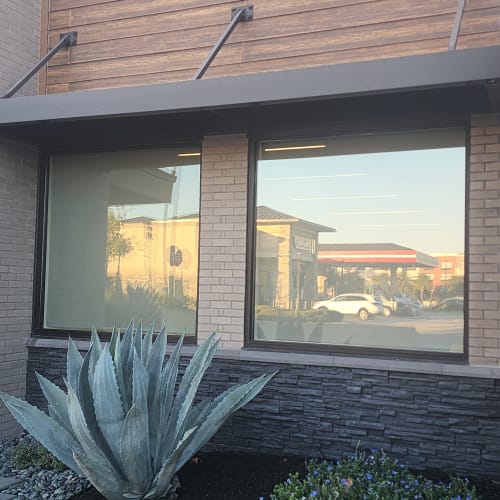 insulated glass conference room window replacement in Winter Park office building. Click to open in modal.